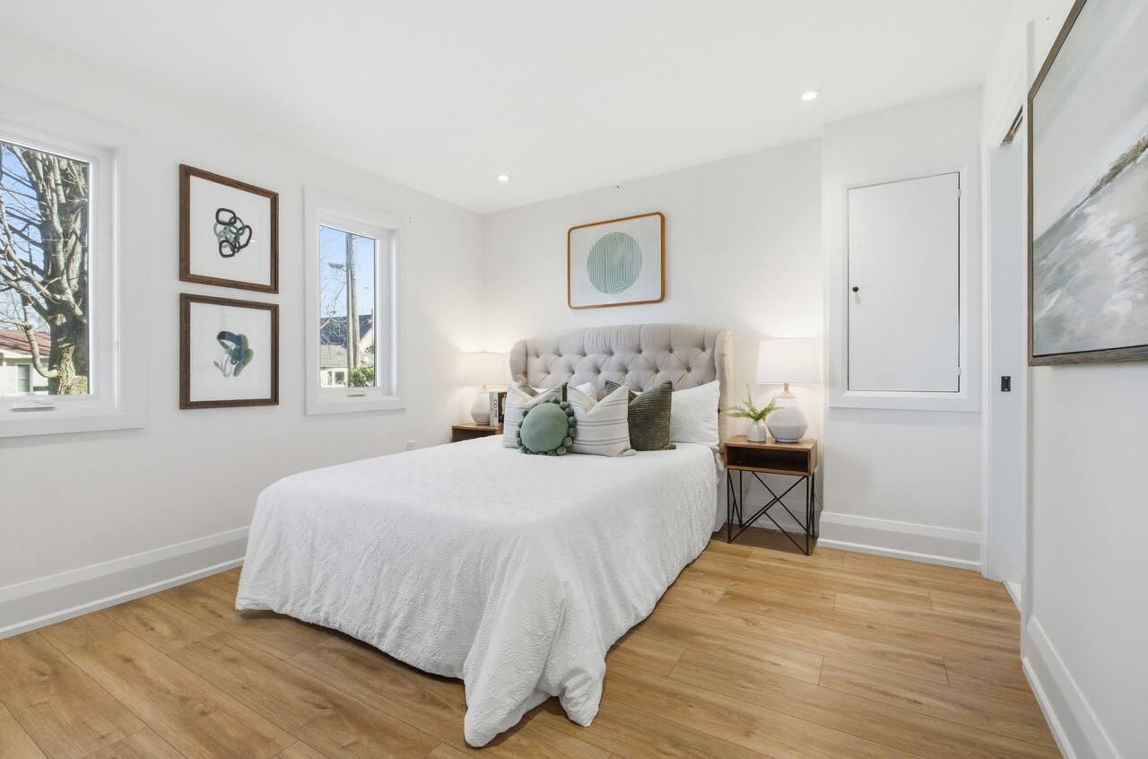 Queen bedroom with tufted headboard