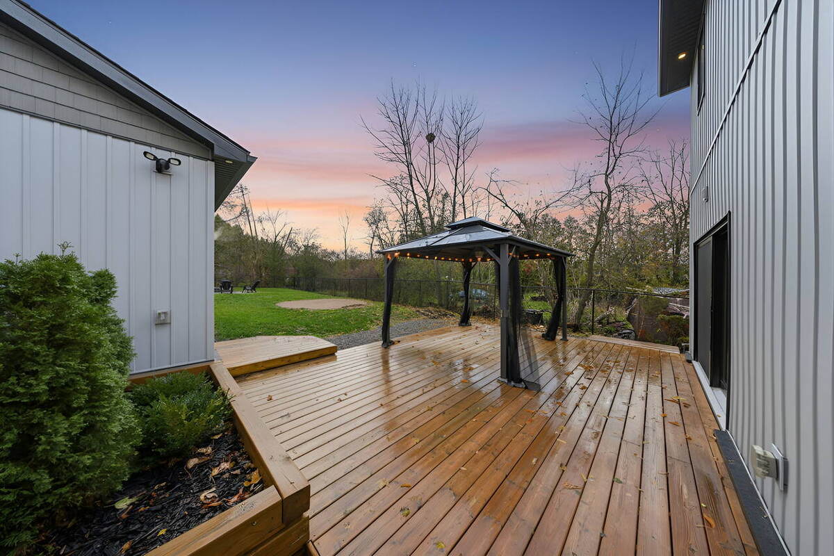Deck and backyard at dusk